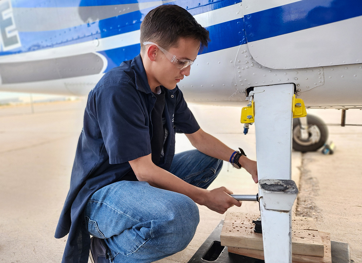 Student working on landing gear