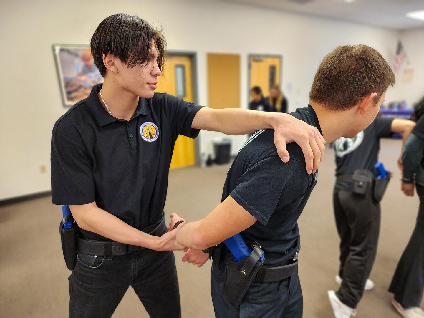 Student handcuffing another student