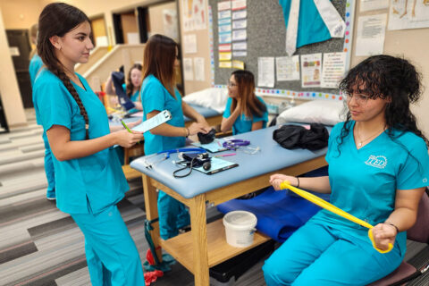 Student using resistance bands