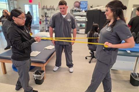 Students using resistance bands