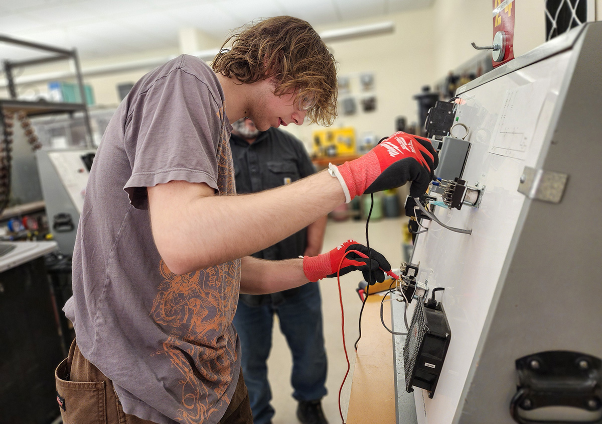 Student working on electrical panel