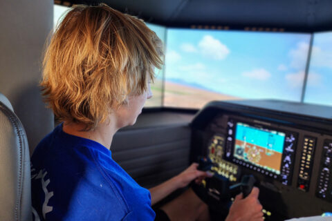 Student flying flight simulator