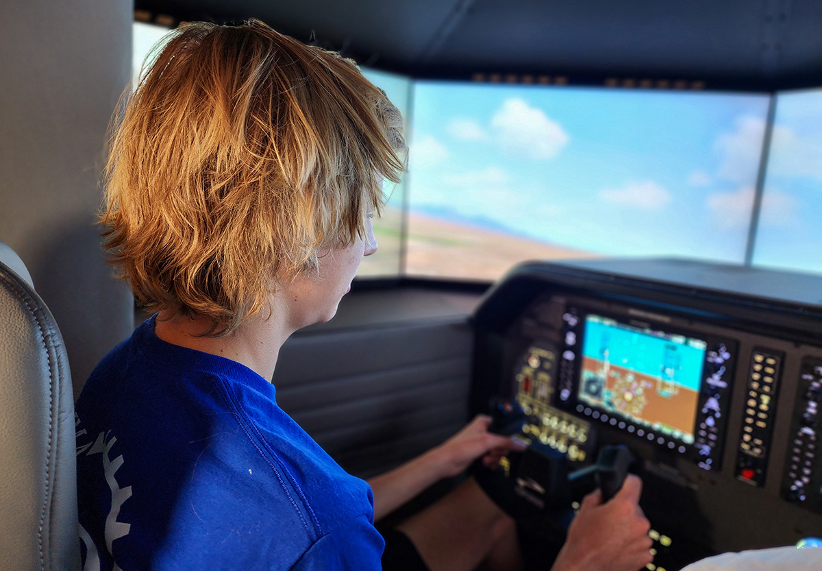 Student flying flight simulator