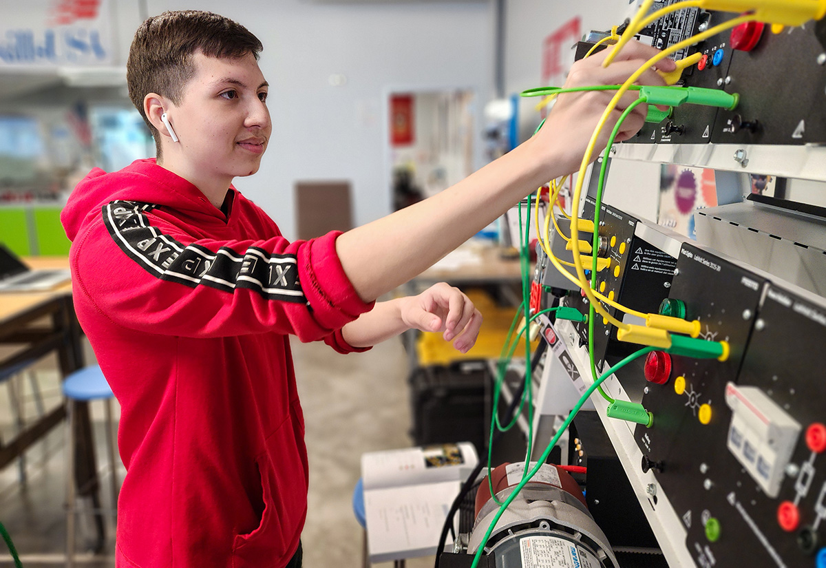 Student working on circuit board