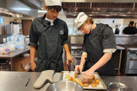 Students checking temperature of chicken wings