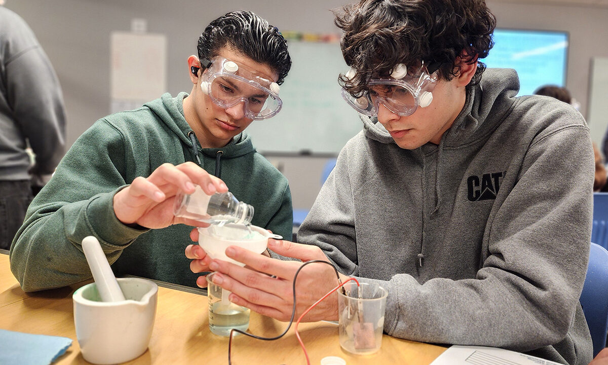 Students performing copper extraction