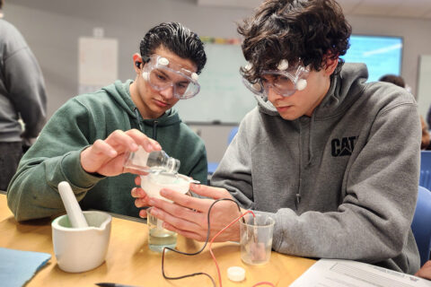 Students performing copper extraction