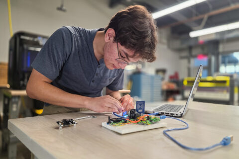 Student connecting wires