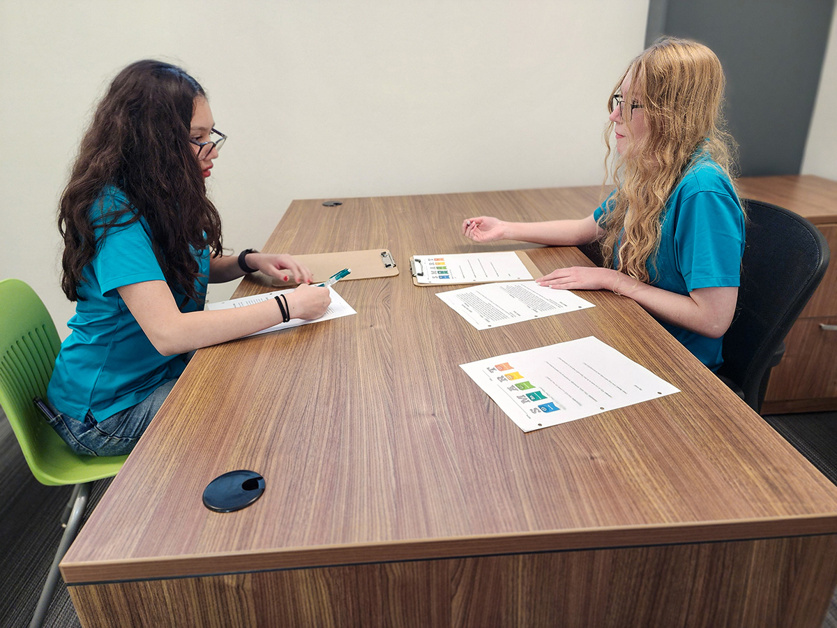 Students holding mock therapy session