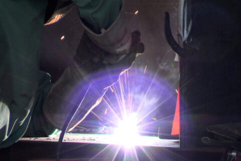 Student Welding in Construction Class