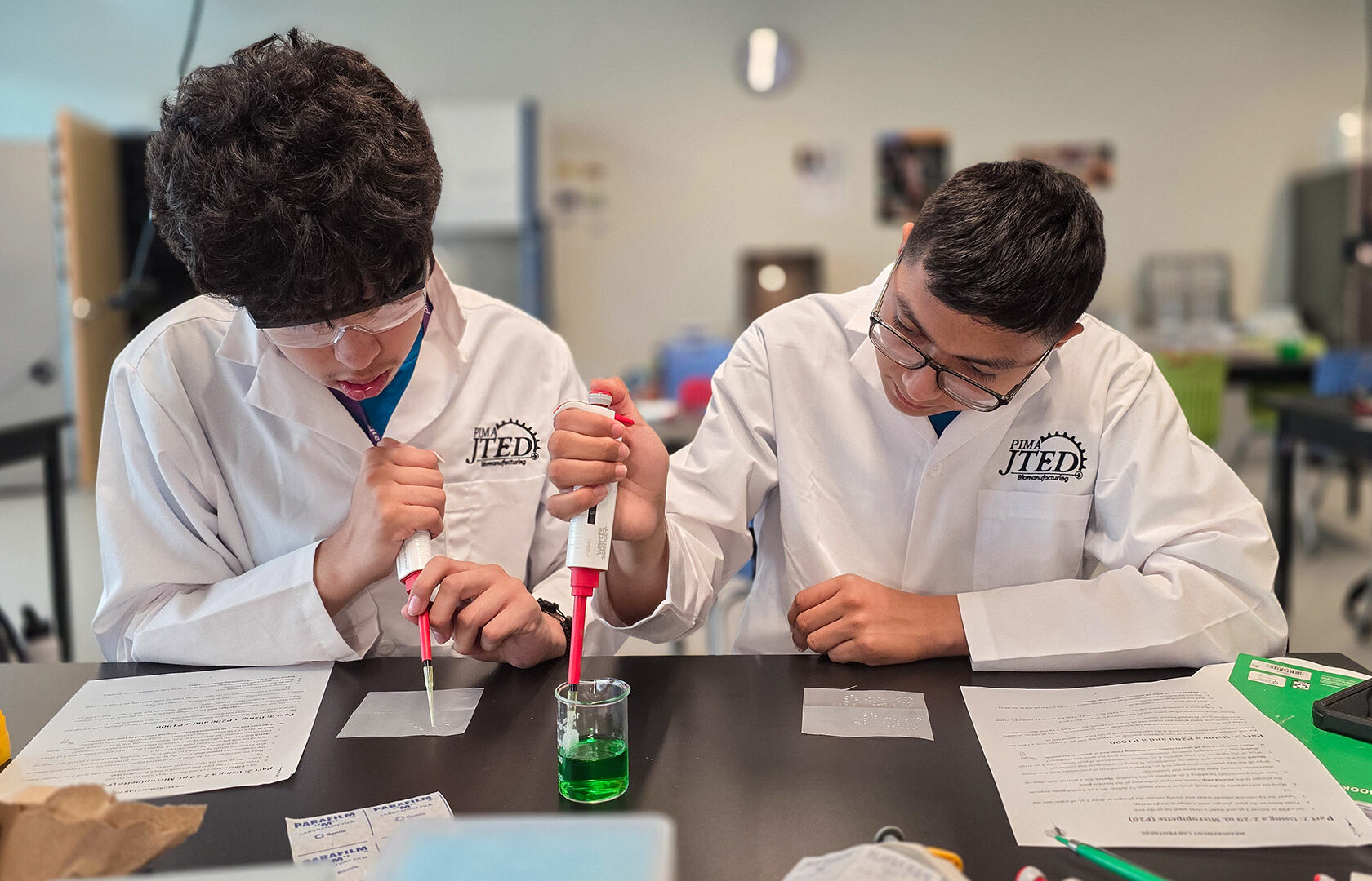 Students using micropipettes