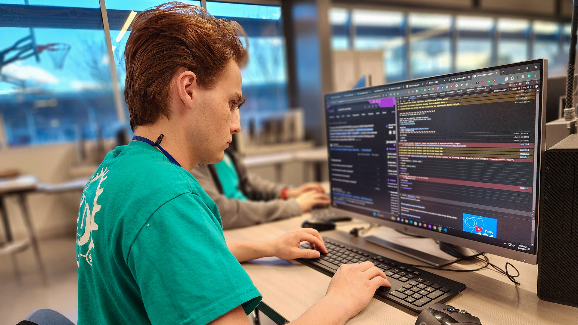 Student working on computer codes