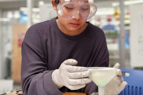 Student extracting copper