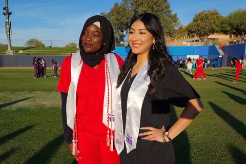 Two students posing for a picture