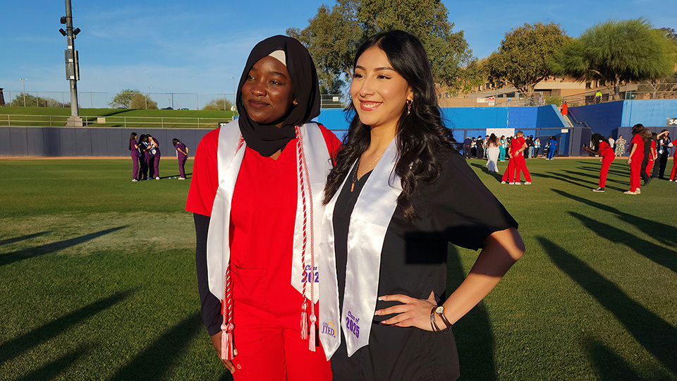 Two students posing for a picture