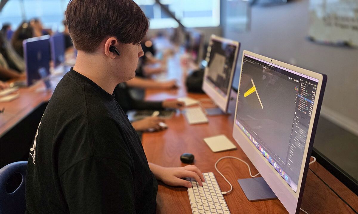 Student making animation on computer