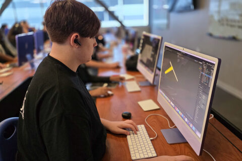 Student making animation on computer