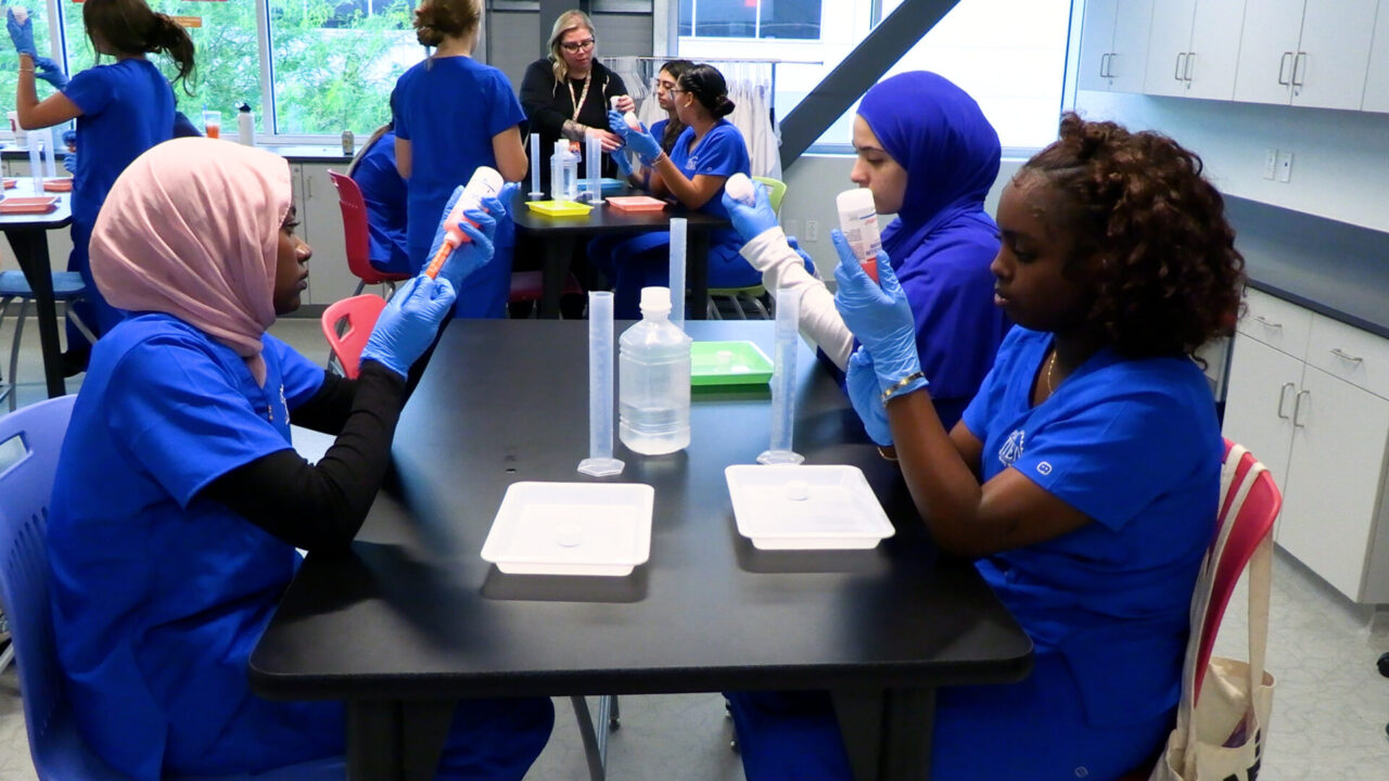 Students doing Antibiotic Reconstitution with syringe