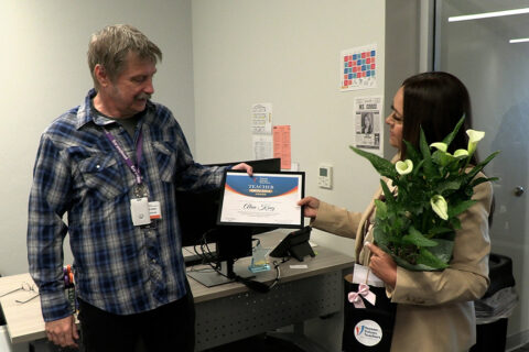 Instructor getting award