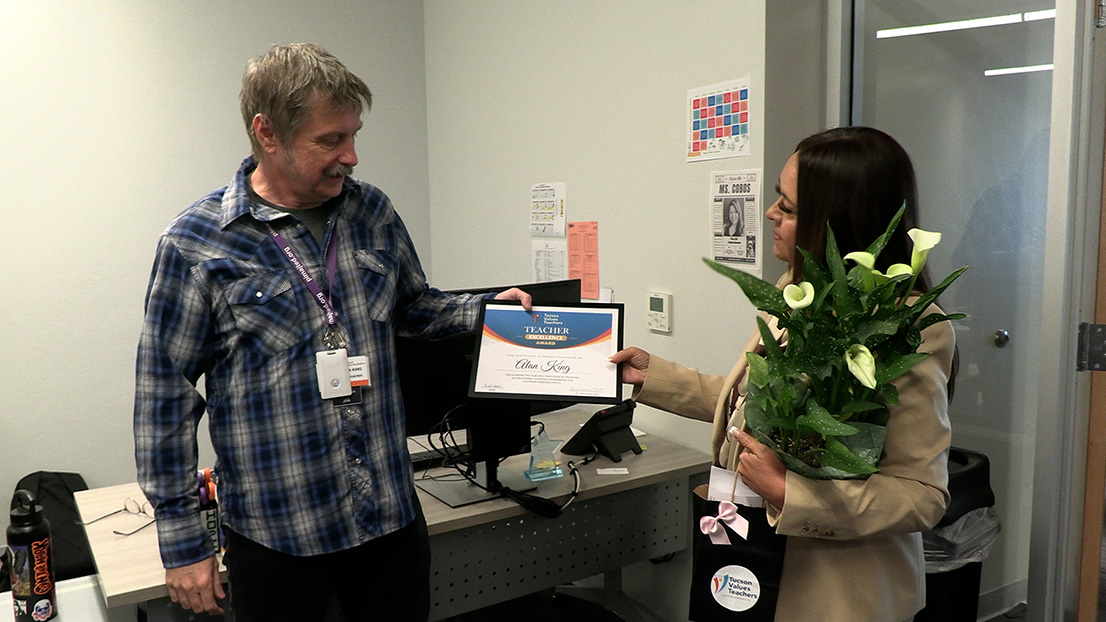 Instructor getting award