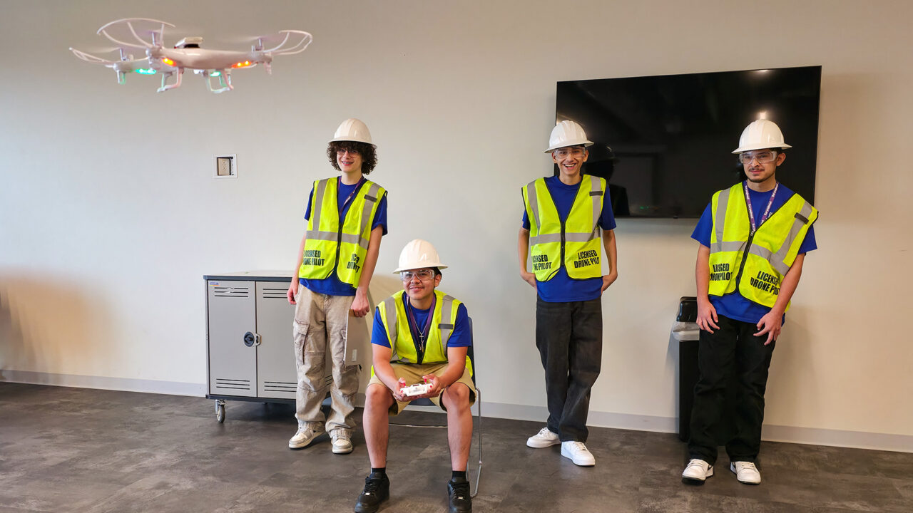 Students flying small drone