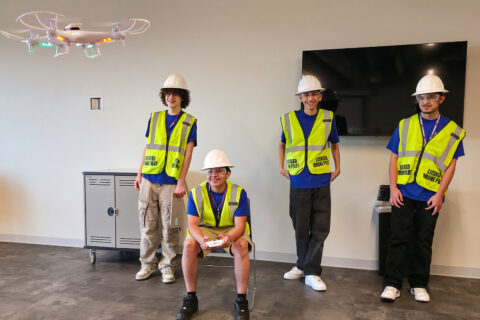 Students flying small drone