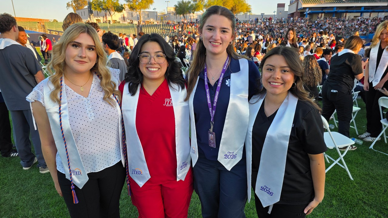 Students from different programs posing together